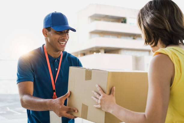 Courier completing a package handoff with a customer